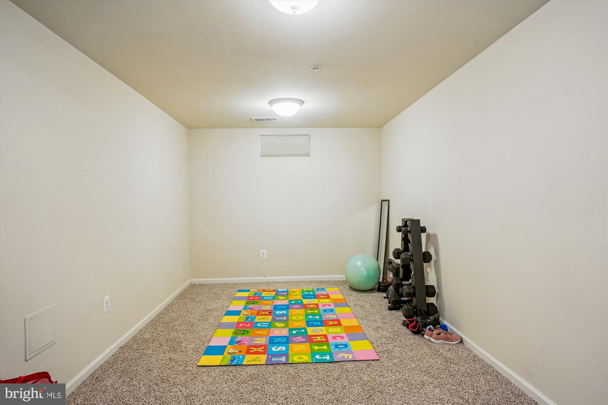11903 Deer Spring Way Clarksburg, MD 20871 - Photo 48 of 88 a room with toys and wooden floor