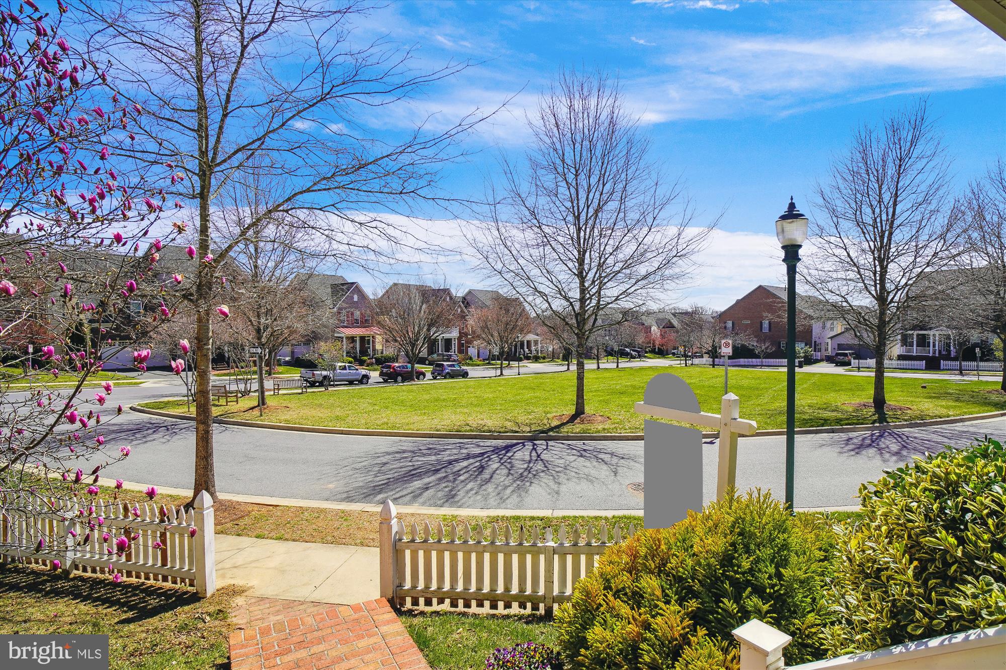 11903 Deer Spring Way Clarksburg, MD 20871 - Photo 5 of 88 a view of a swimming pool with a yard and sitting area