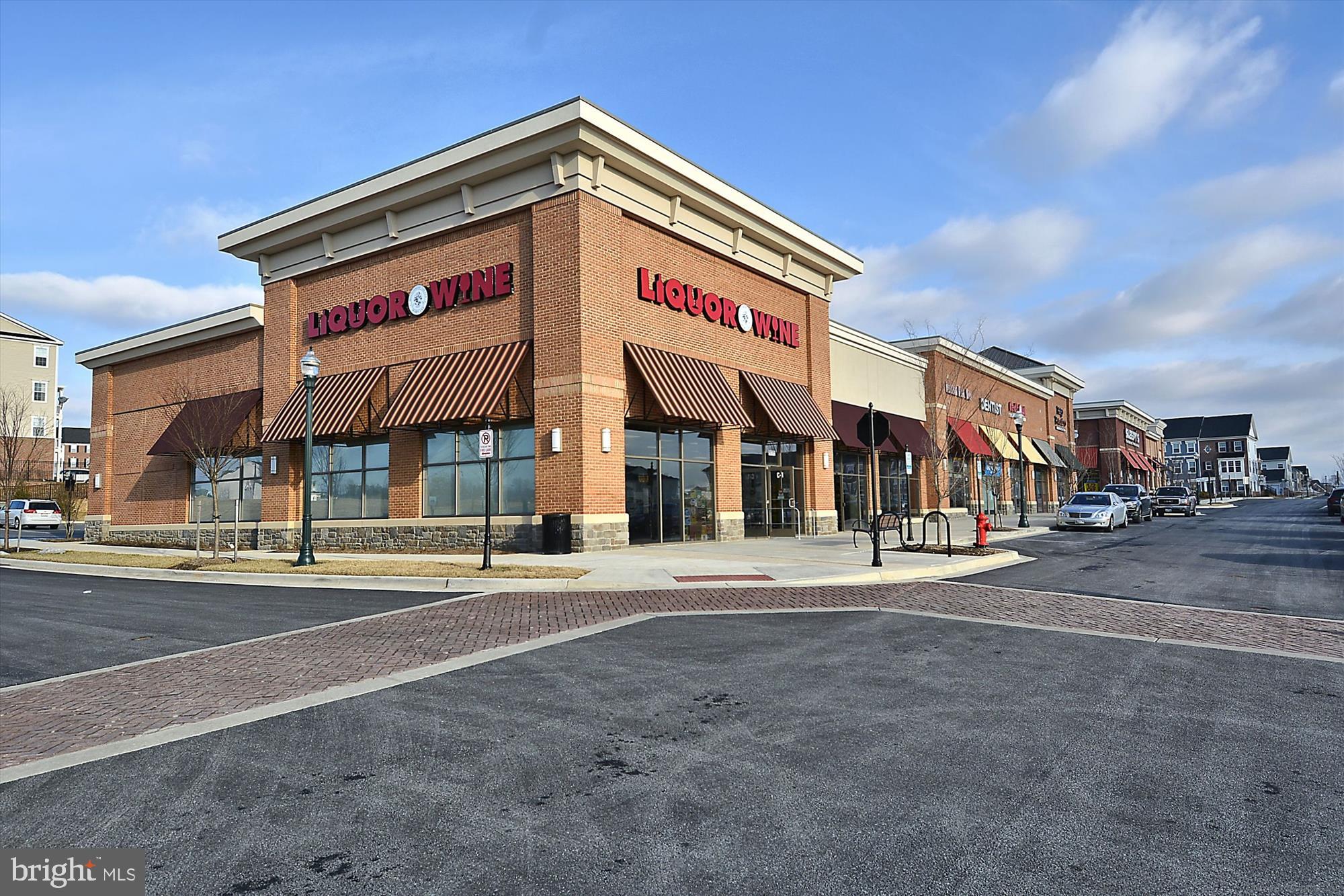 11903 Deer Spring Way Clarksburg, MD 20871 - Photo 83 of 88 a view of a food mall next to a road