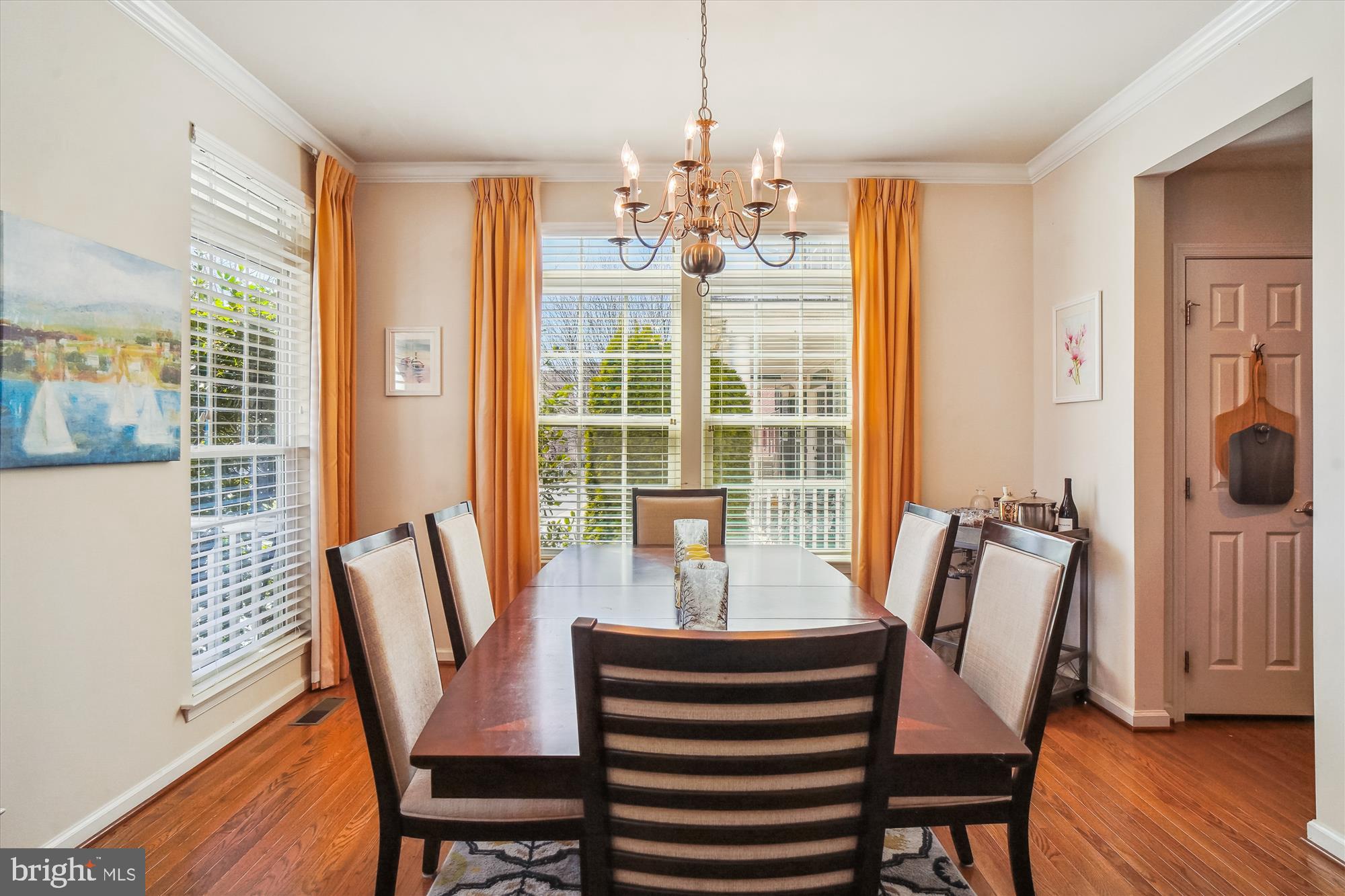 11903 Deer Spring Way Clarksburg, MD 20871 - Photo 9 of 88 a view of a dining room with furniture and wooden floor