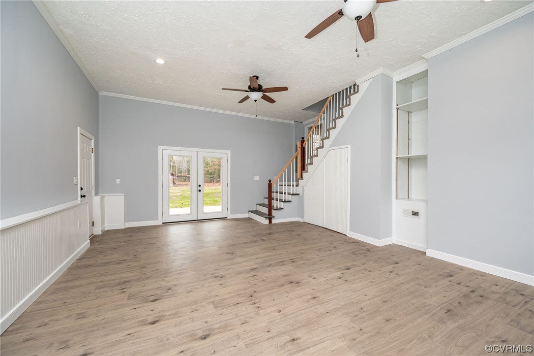 4741 Roxbury Road Charles City, VA 23030 - Photo 15 of 32 a view of empty room with wooden floor and fan