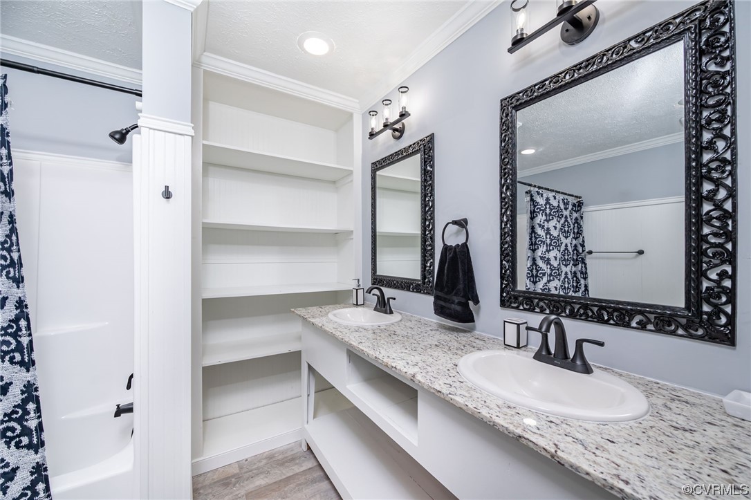 4741 Roxbury Road Charles City, VA 23030 - Photo 16 of 32 a bathroom with double vanity sink and a mirror