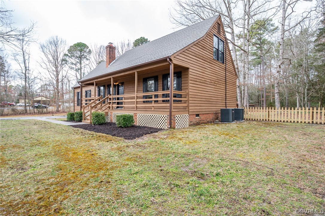 4741 Roxbury Road Charles City, VA 23030 - Photo 2 of 32 a front view of a house with a yard