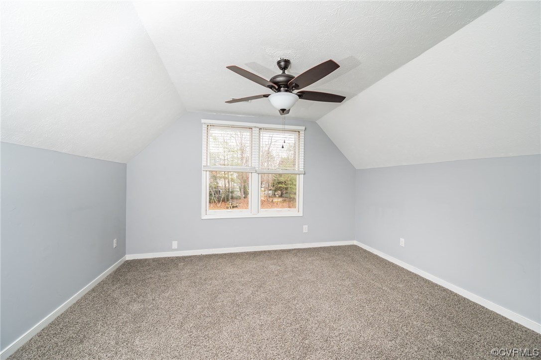 4741 Roxbury Road Charles City, VA 23030 - Photo 21 of 32 an empty room with a window and a fan