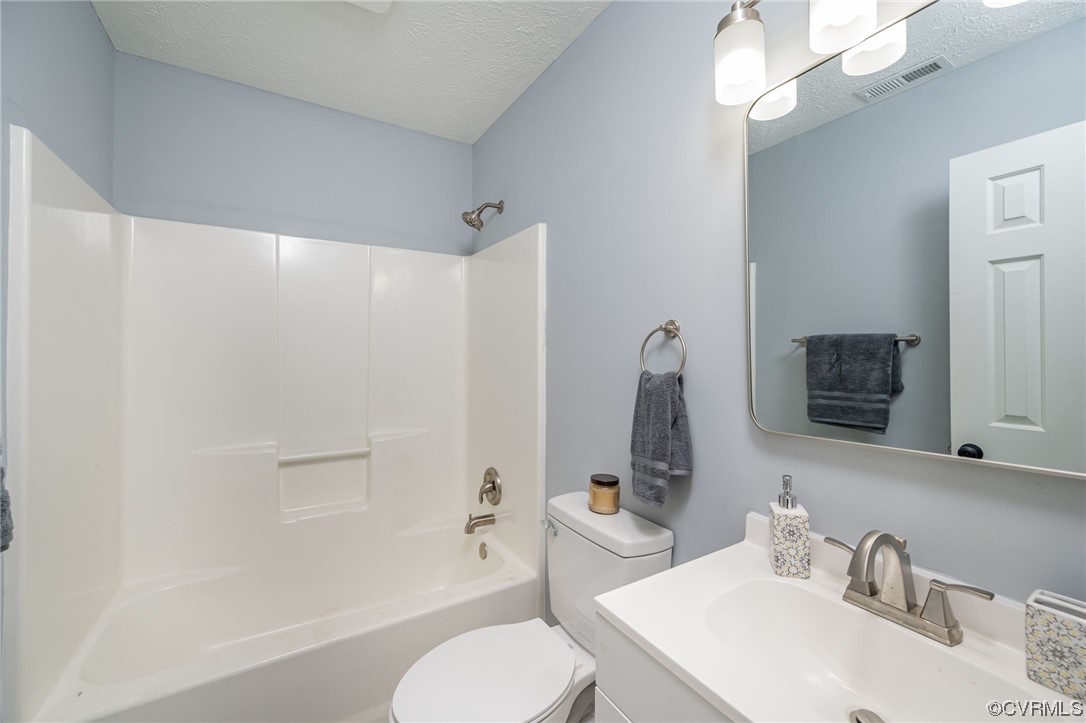 4741 Roxbury Road Charles City, VA 23030 - Photo 23 of 32 a bathroom with a sink toilet and shower