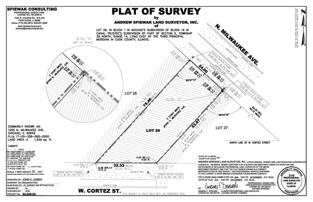 a front view of a building with many windows