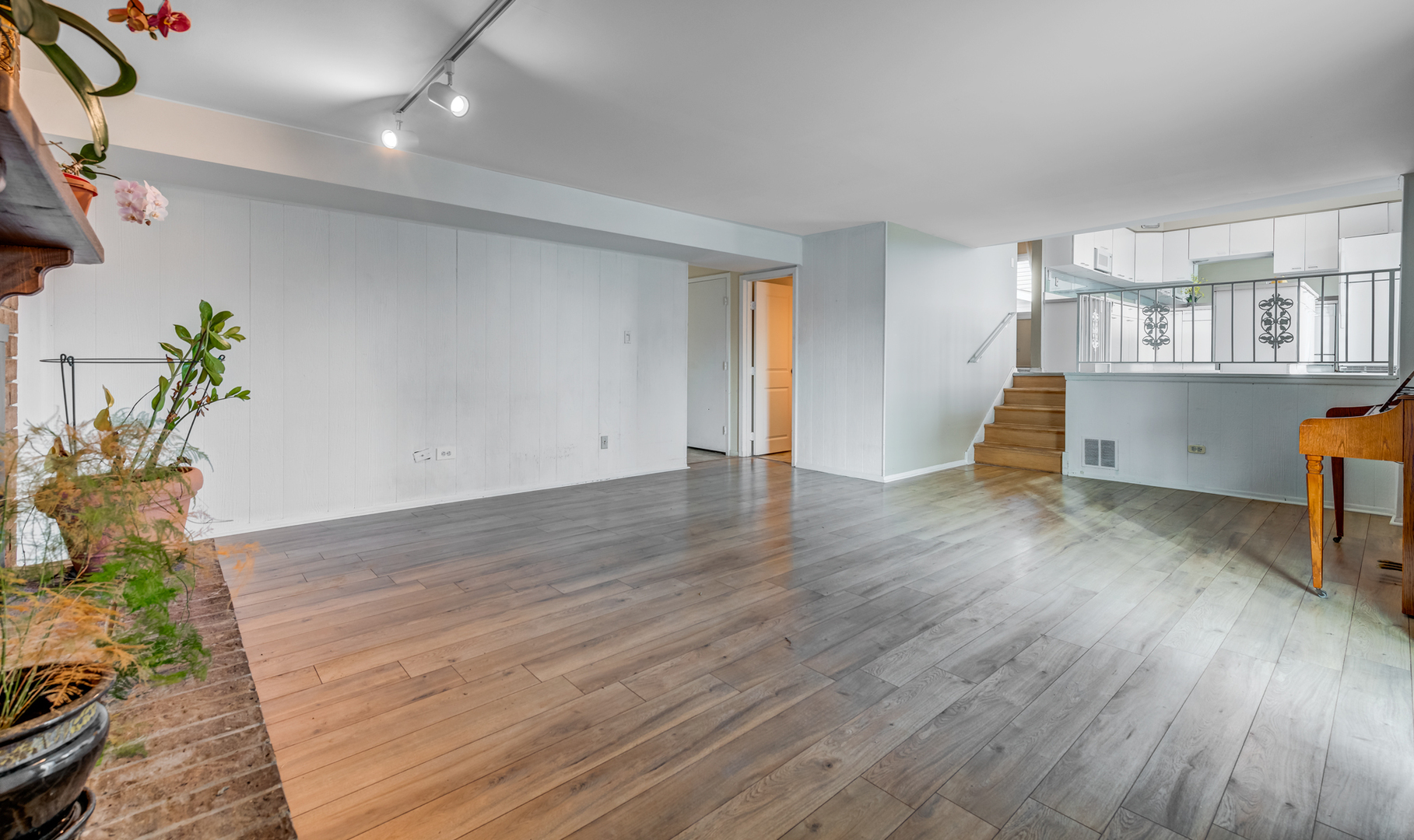 1651 West Goldengate Drive Addison, IL 60101 - Photo 11 of 24 wooden floor in an empty room with a workspace