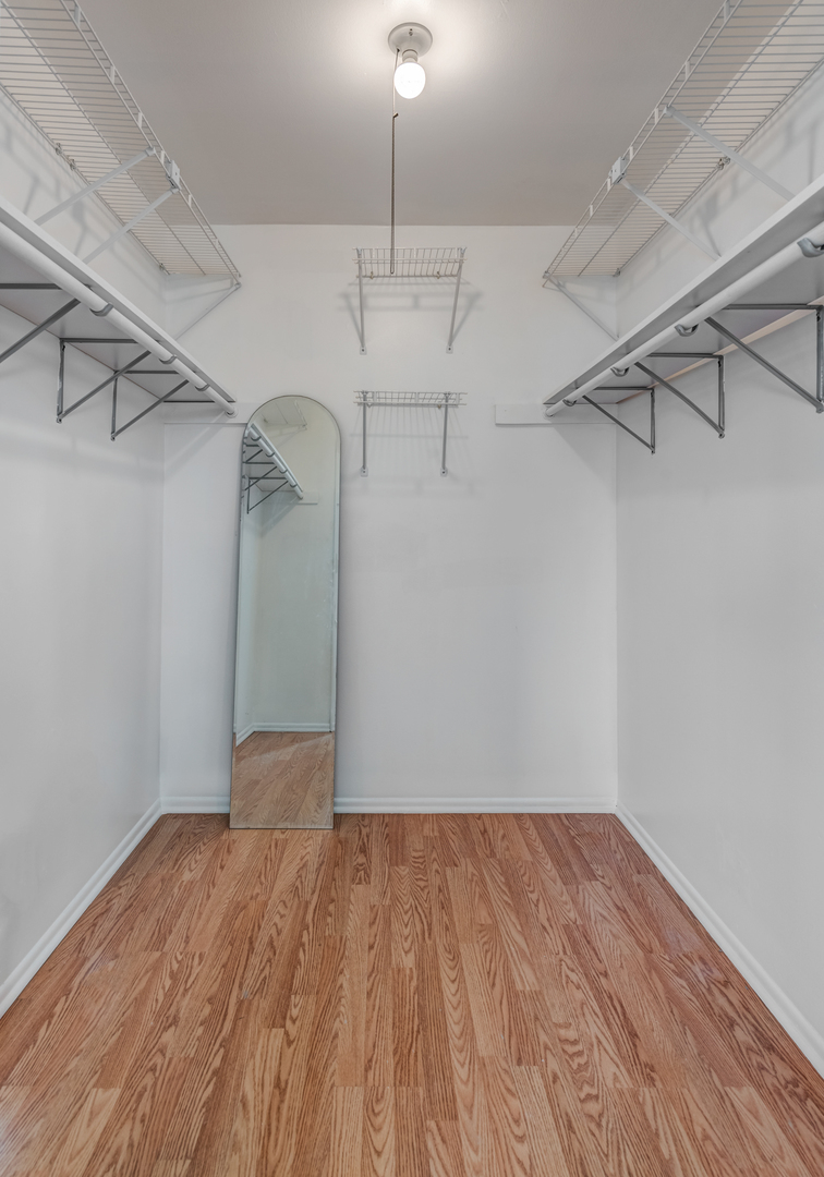 1651 West Goldengate Drive Addison, IL 60101 - Photo 15 of 24 a view of a room with wooden floor