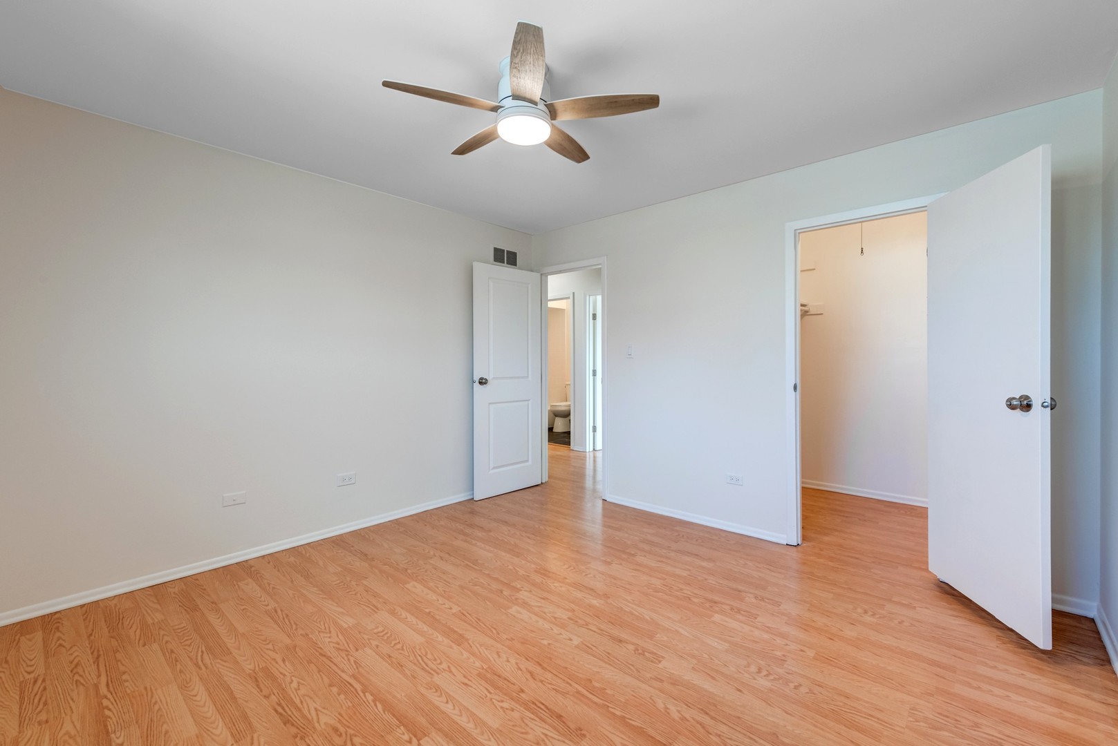 1651 West Goldengate Drive Addison, IL 60101 - Photo 17 of 24 wooden floor in an empty room