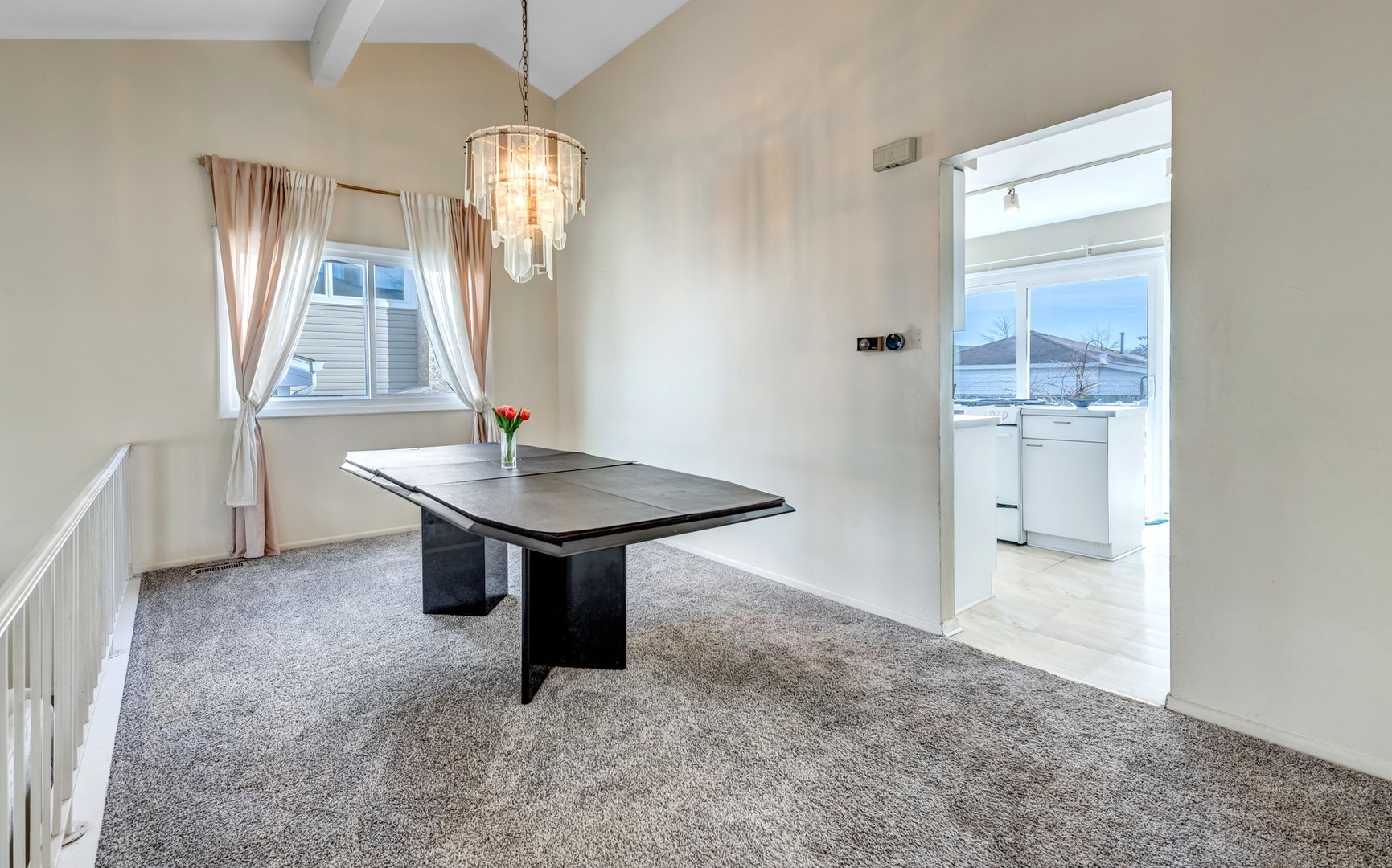 1651 West Goldengate Drive Addison, IL 60101 - Photo 6 of 24 a view of a livingroom with a table and chairs