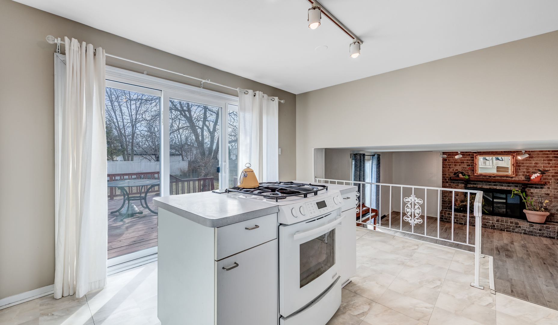 1651 West Goldengate Drive Addison, IL 60101 - Photo 9 of 24 a kitchen that has a stove and a table