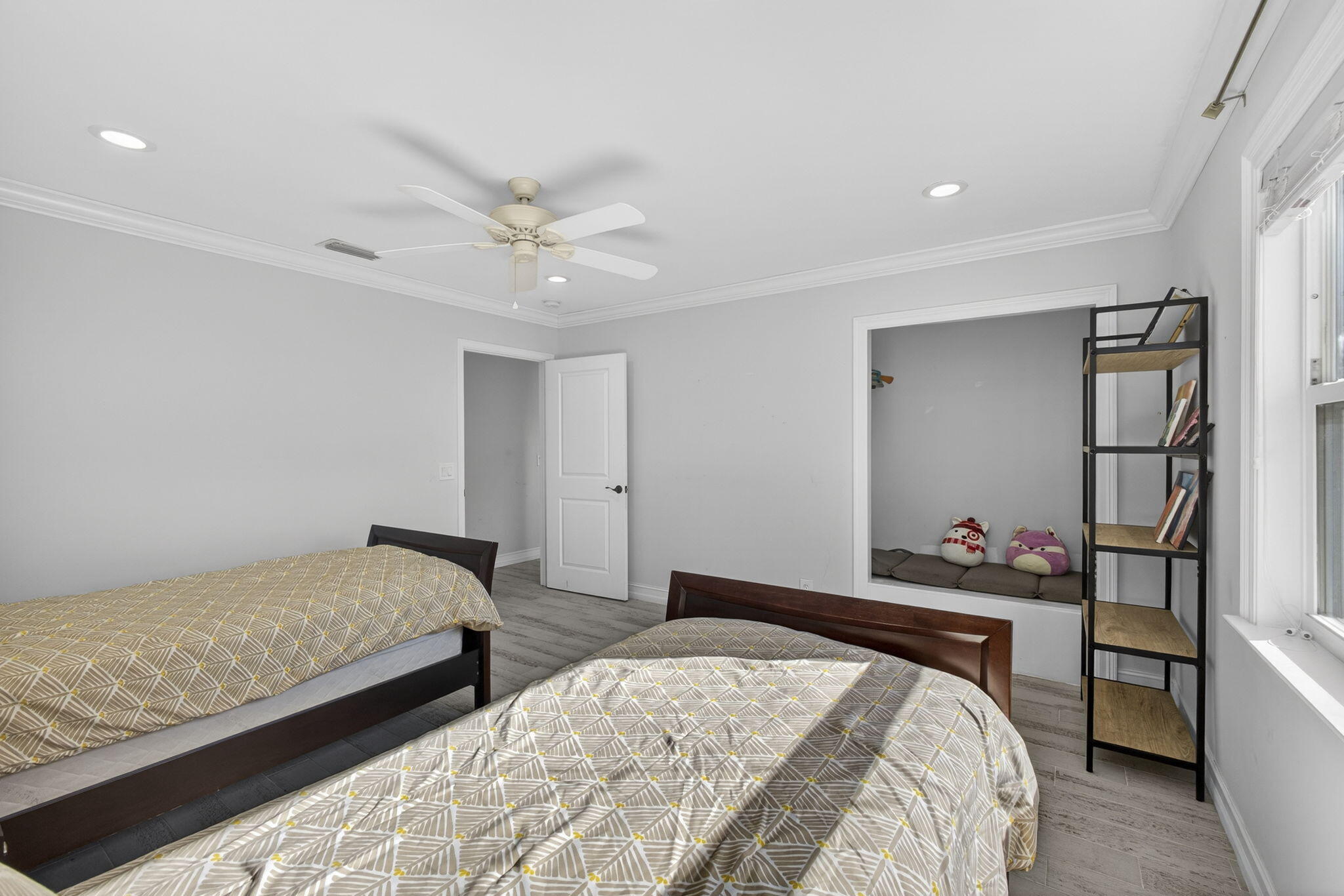 16490 Rustic Road Wellington, FL 33470 - Photo 26 of 81 a bedroom with a bed and a refrigerator