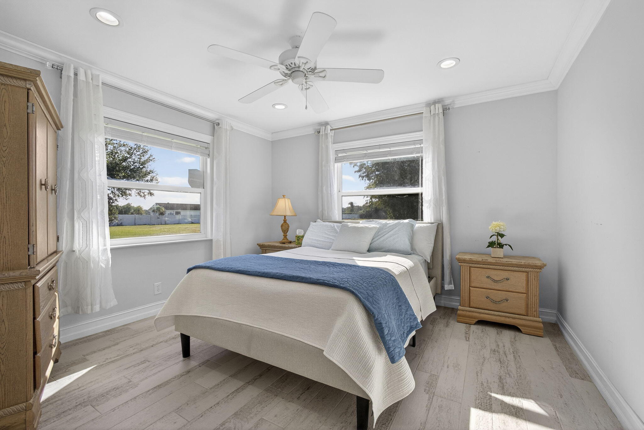 16490 Rustic Road Wellington, FL 33470 - Photo 34 of 81 a bedroom with a bed and a window