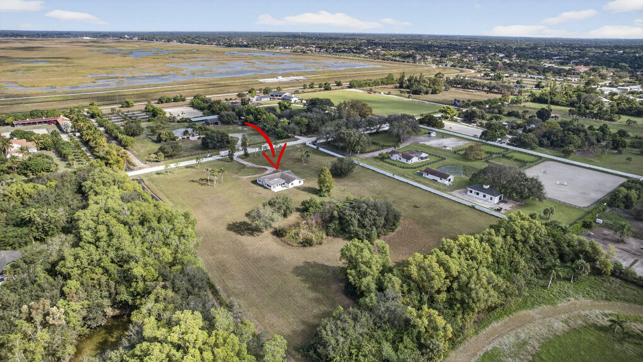 16490 Rustic Road Wellington, FL 33470 - Photo 67 of 81 a view of a city and ocean view