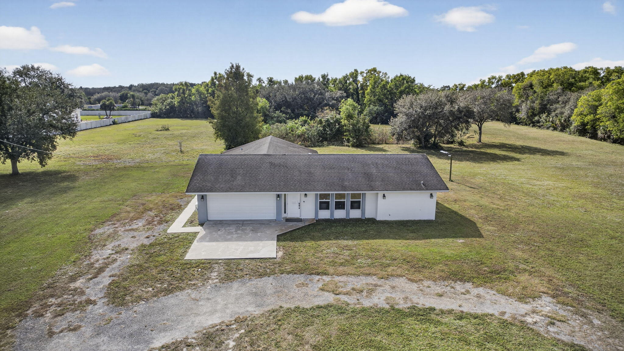 16490 Rustic Road Wellington, FL 33470 - Photo 70 of 81 a aerial view of a house