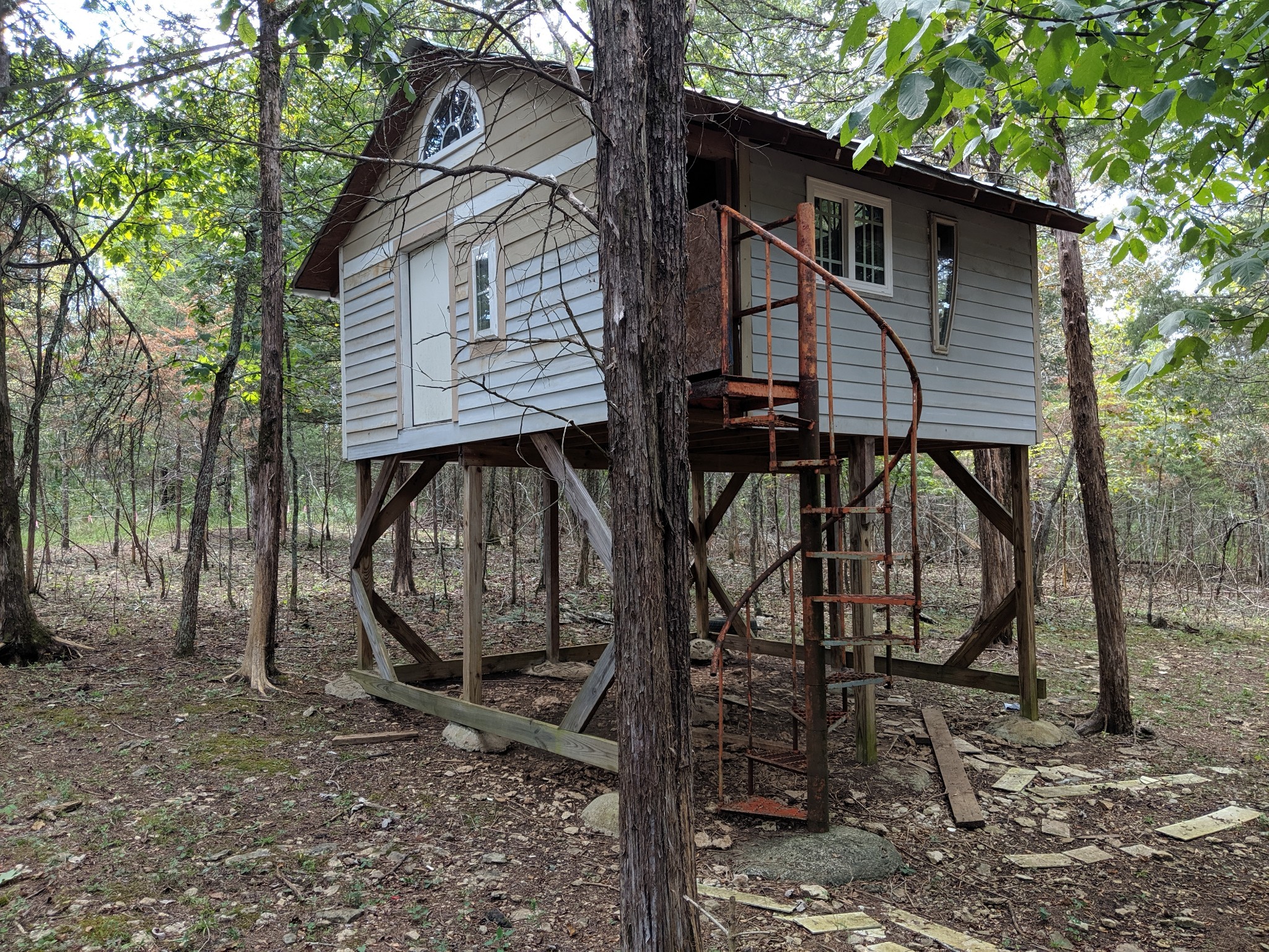 2124 Carpenter Bridge Road Columbia, TN 38401 - Photo 22 of 28 a view of a house with large trees next to a road
