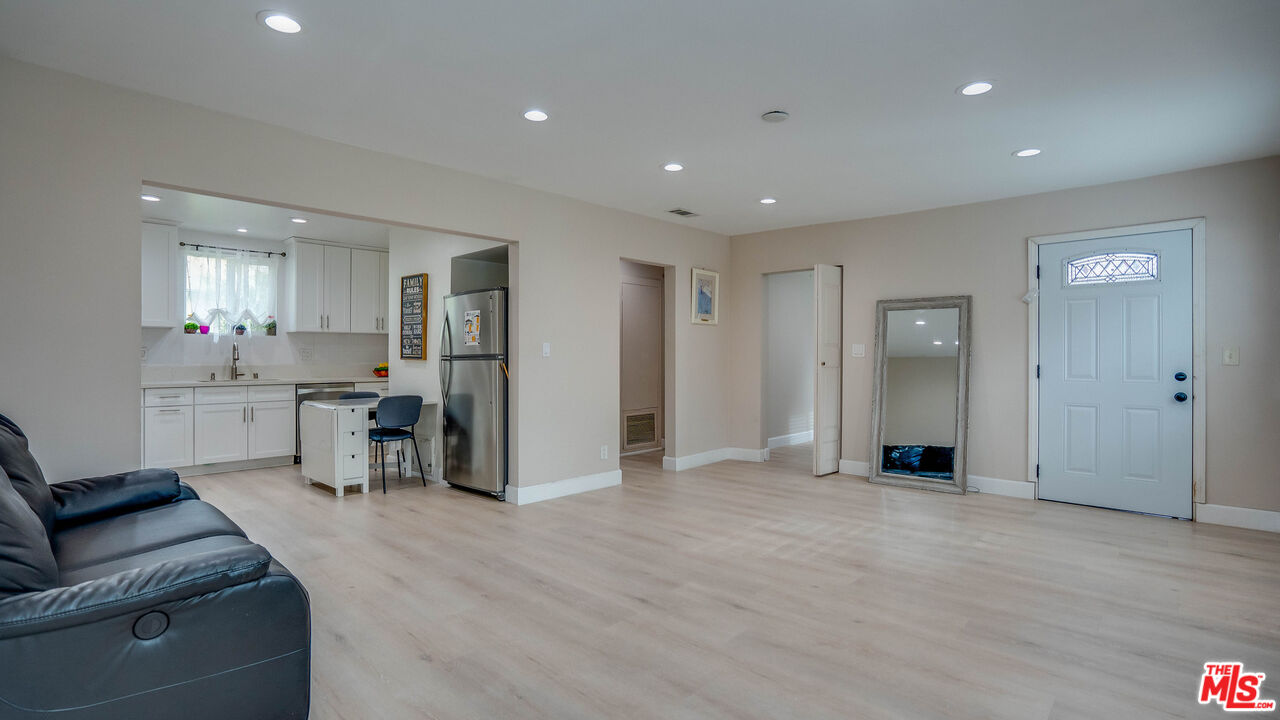 263 Flower Street Pasadena, CA 91104 - Photo 16 of 34 a view of a kitchen with refrigerator and windows