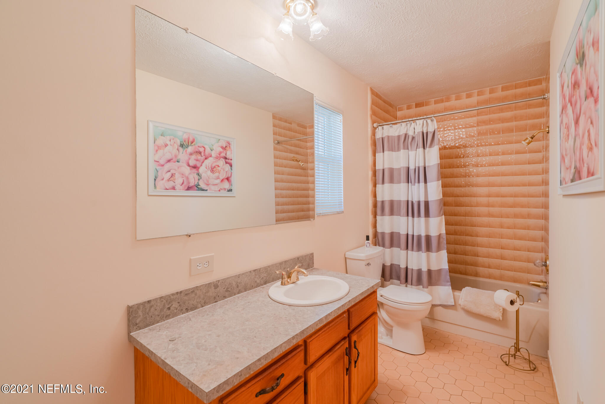 4612 Castleton Drive Jacksonville, FL 32208 - Photo 28 of 41 a bathroom with a sink toilet and shower