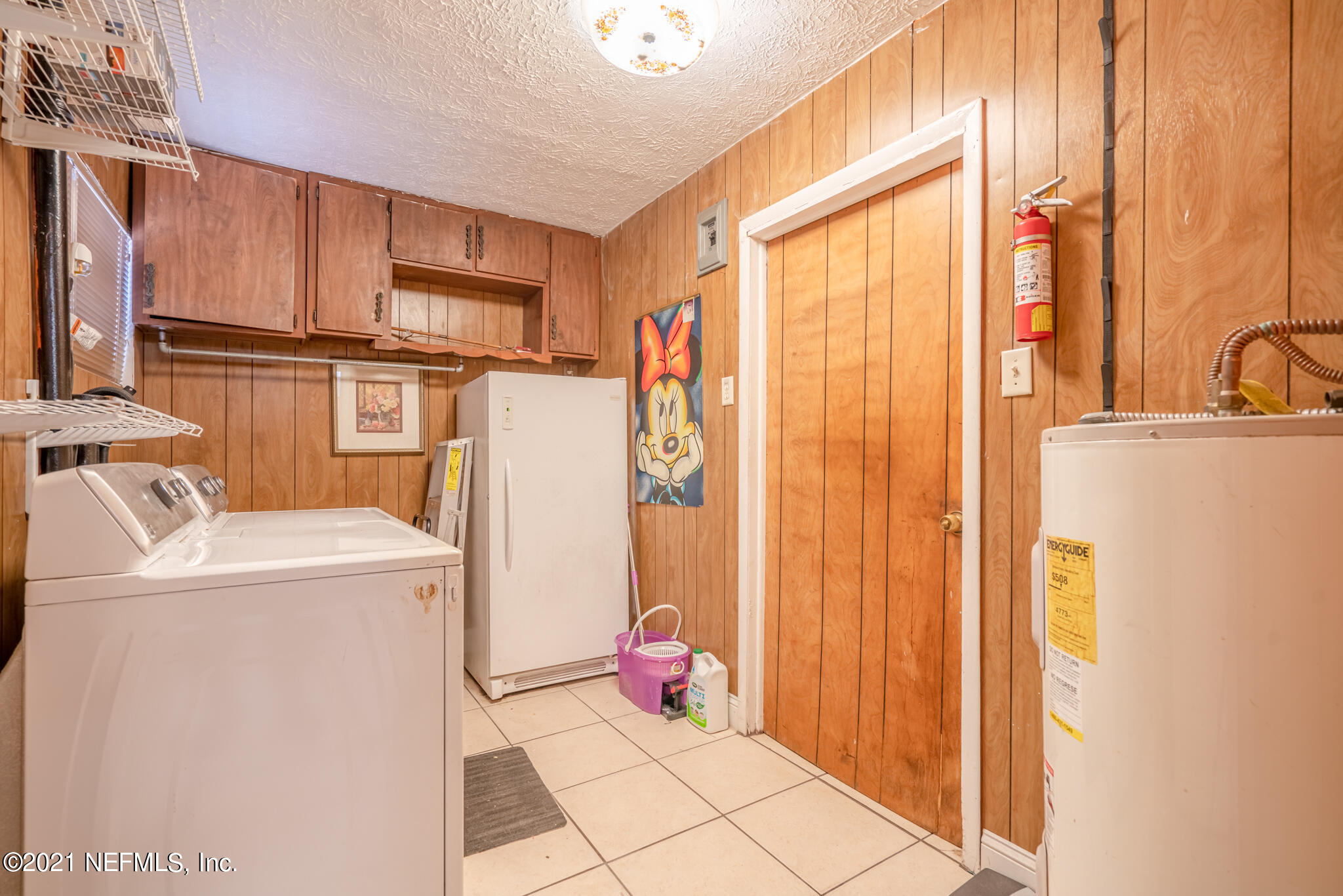 4612 Castleton Drive Jacksonville, FL 32208 - Photo 31 of 41 a utility room with dryer and washer