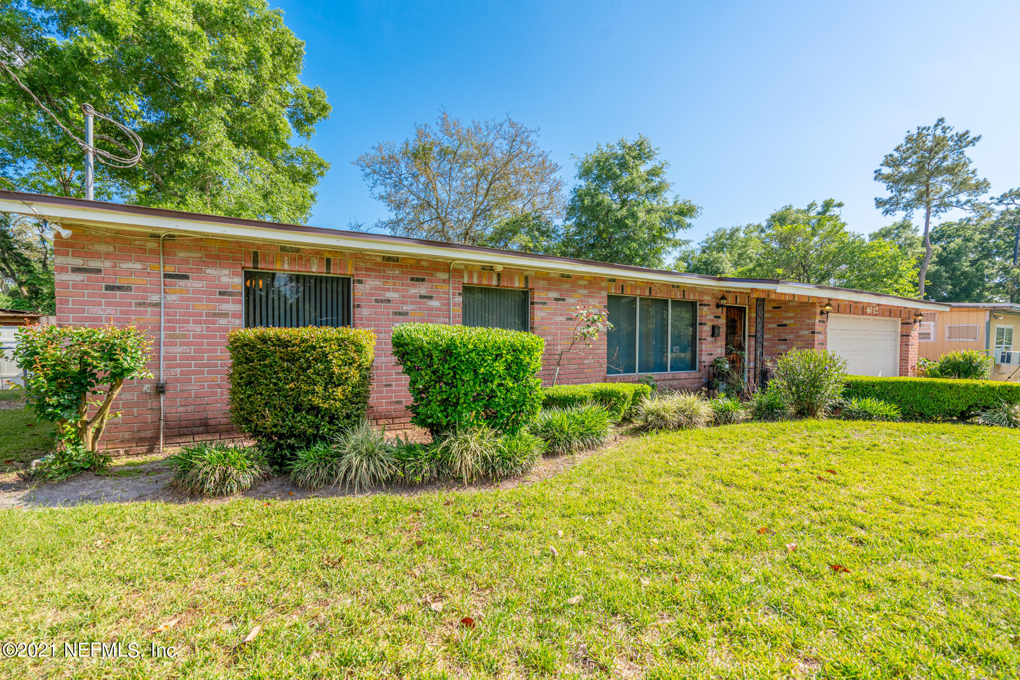 4612 Castleton Drive Jacksonville, FL 32208 - Photo 7 of 41 front view of a house with a yard