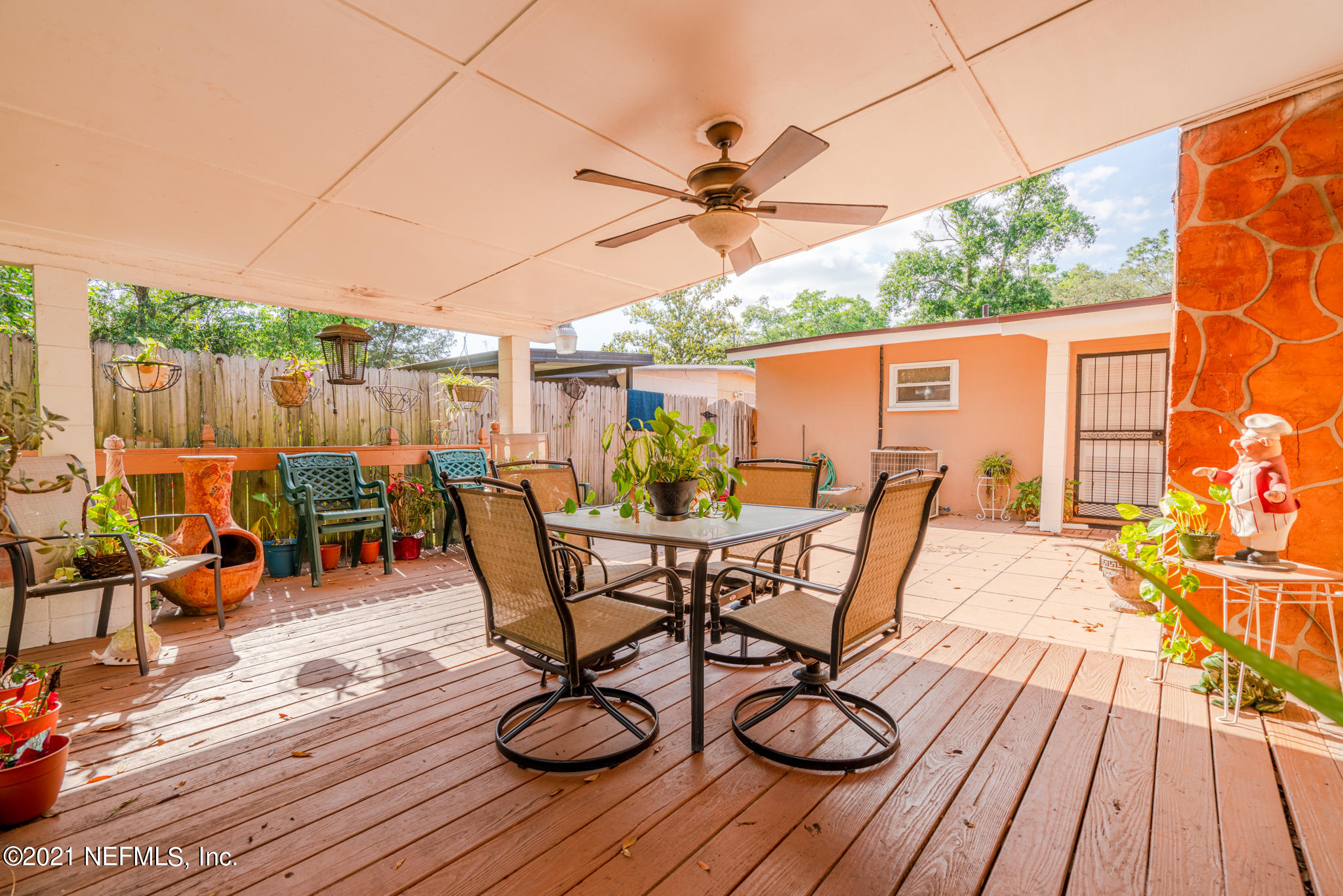 4612 Castleton Drive Jacksonville, FL 32208 - Photo 10 of 41 a view of a chairs and table on the deck