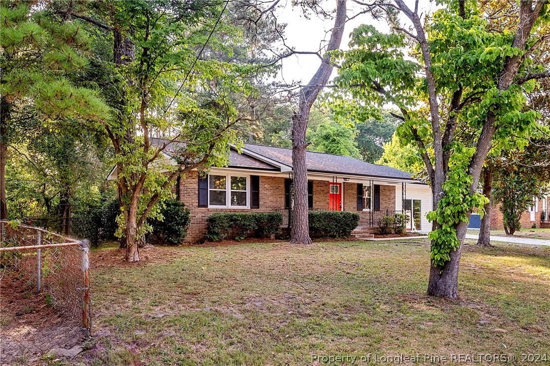 5851 Columbine Road Fayetteville, NC 28306 - Photo 2 of 25 a front view of a house with a yard