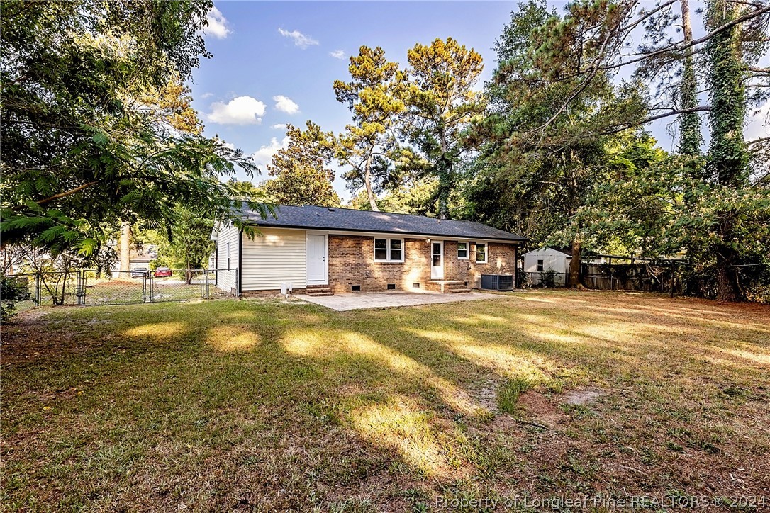 5851 Columbine Road Fayetteville, NC 28306 - Photo 25 of 25 front view of a house with swimming pool