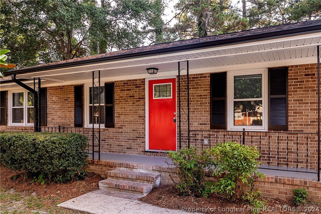 5851 Columbine Road Fayetteville, NC 28306 - Photo 4 of 25 a front view of a house with a yard