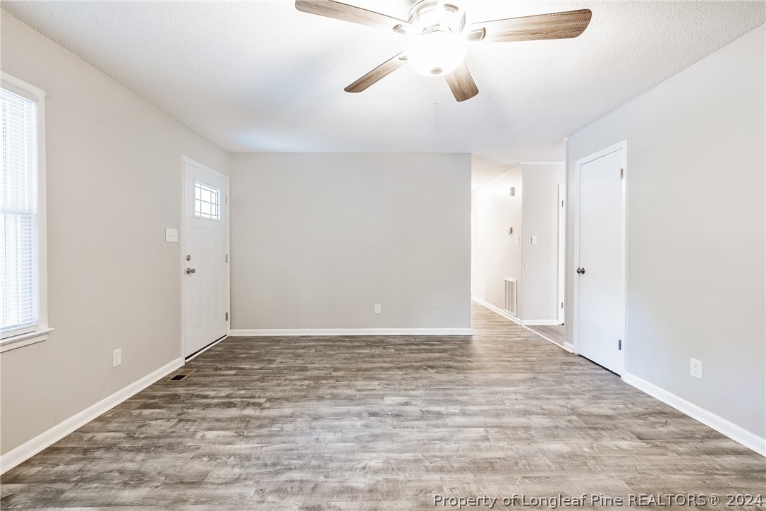 5851 Columbine Road Fayetteville, NC 28306 - Photo 6 of 25 wooden floor in an empty room