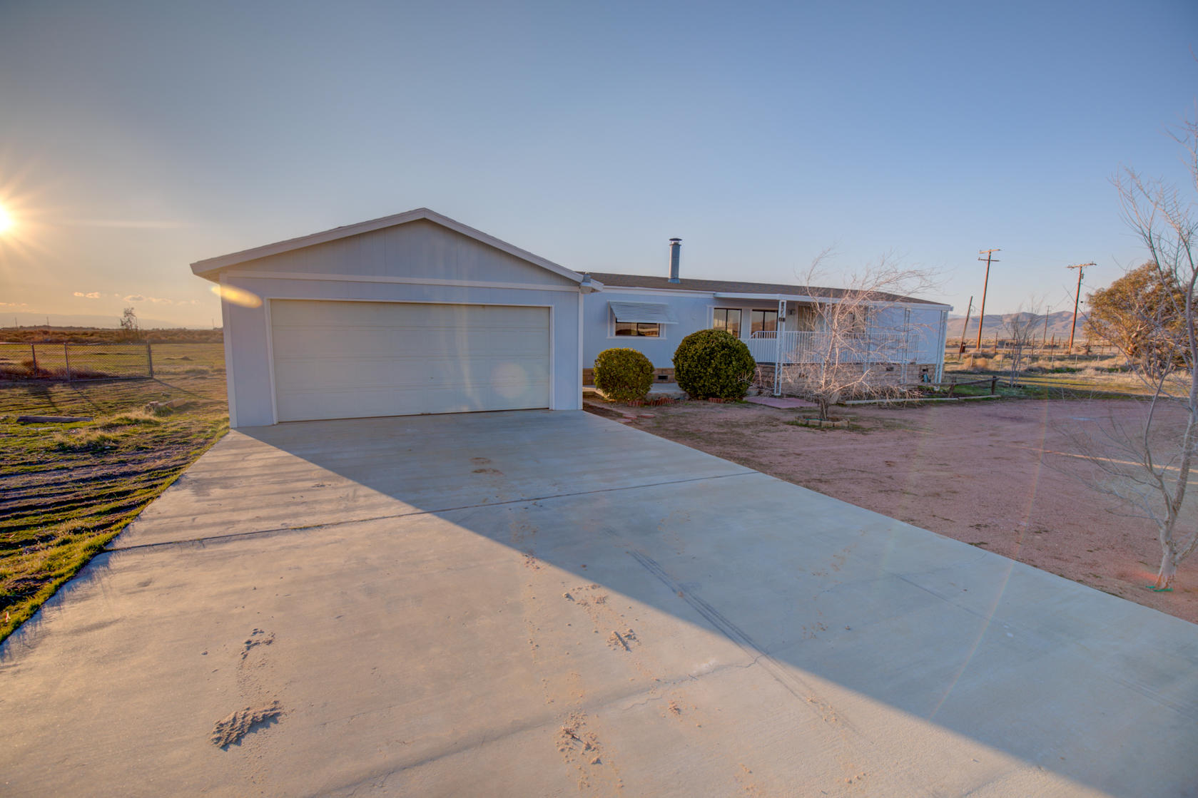851 65th Street West Rosamond, CA 93560 - Photo 2 of 29 a view of a house with a outdoor space
