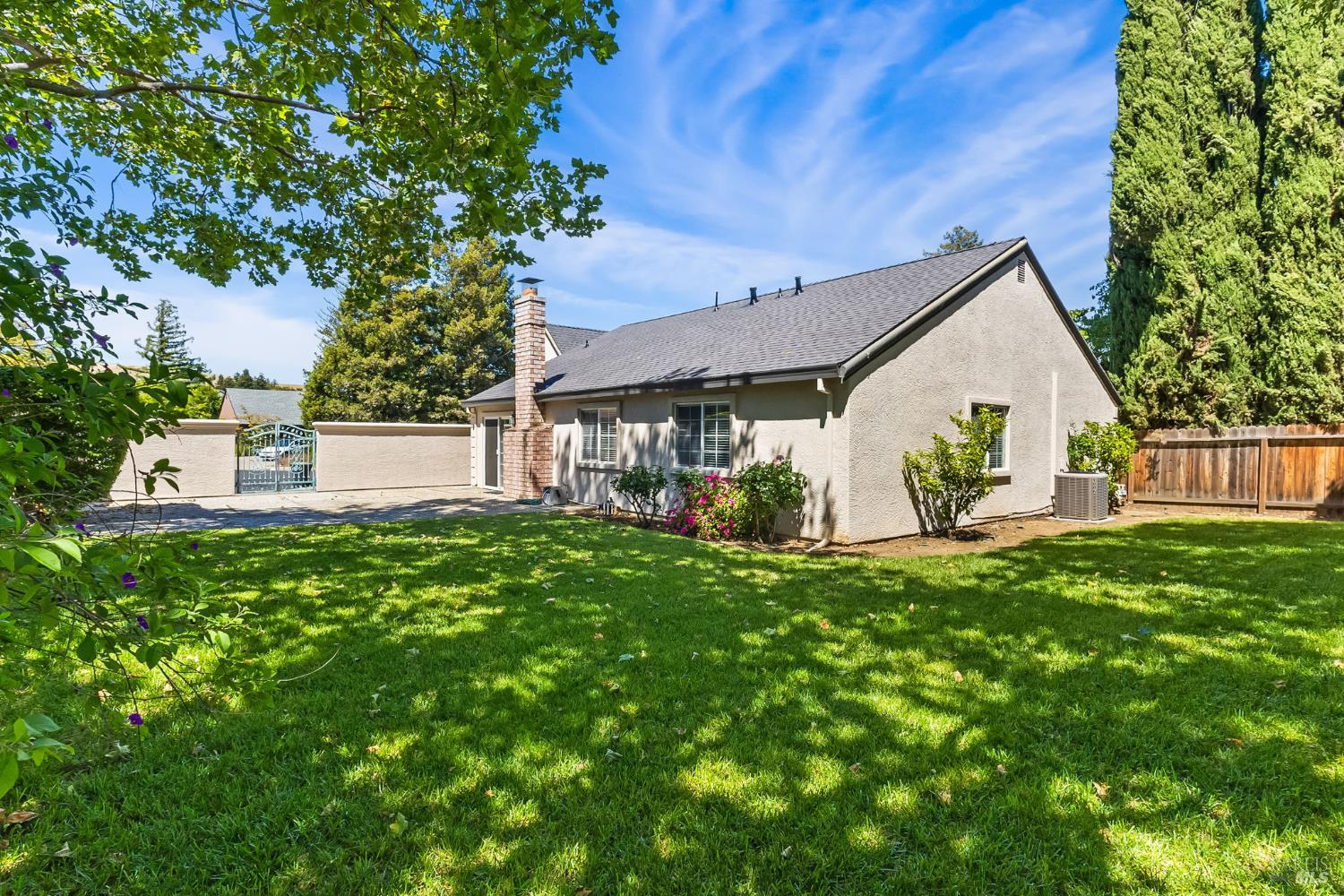 2177 Vista Del Rancho Fairfield, CA 94534 - Photo 22 of 28 a front view of a house with a yard and green space