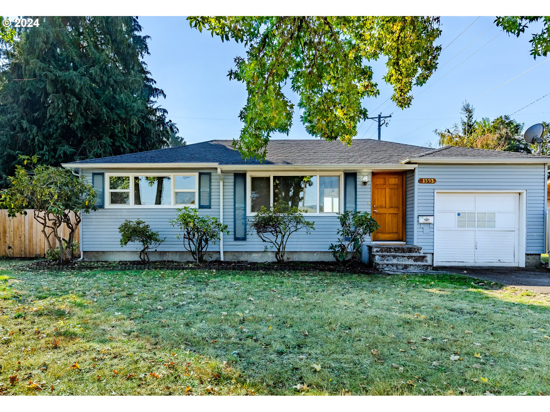 1393 M Street Springfield, OR 97477 - Photo 1 of 24 a view of a house with a yard and sitting area