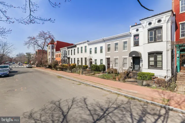 a view of a building with a street