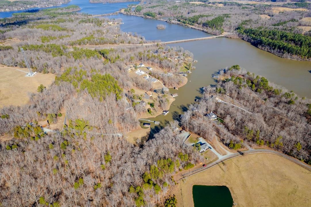 19 Whitetail Lane Semora, NC 27343 - Photo 5 of 9 a view of a lake with a yard