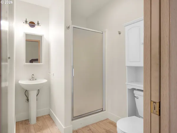 a bathroom with a sink toilet and tub