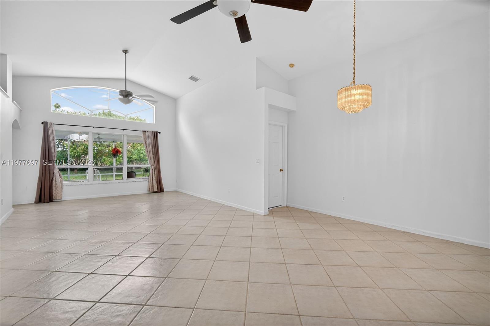 10624 Plainview Circle Boca Raton, FL 33498 - Photo 12 of 49 a view of an empty room with a window