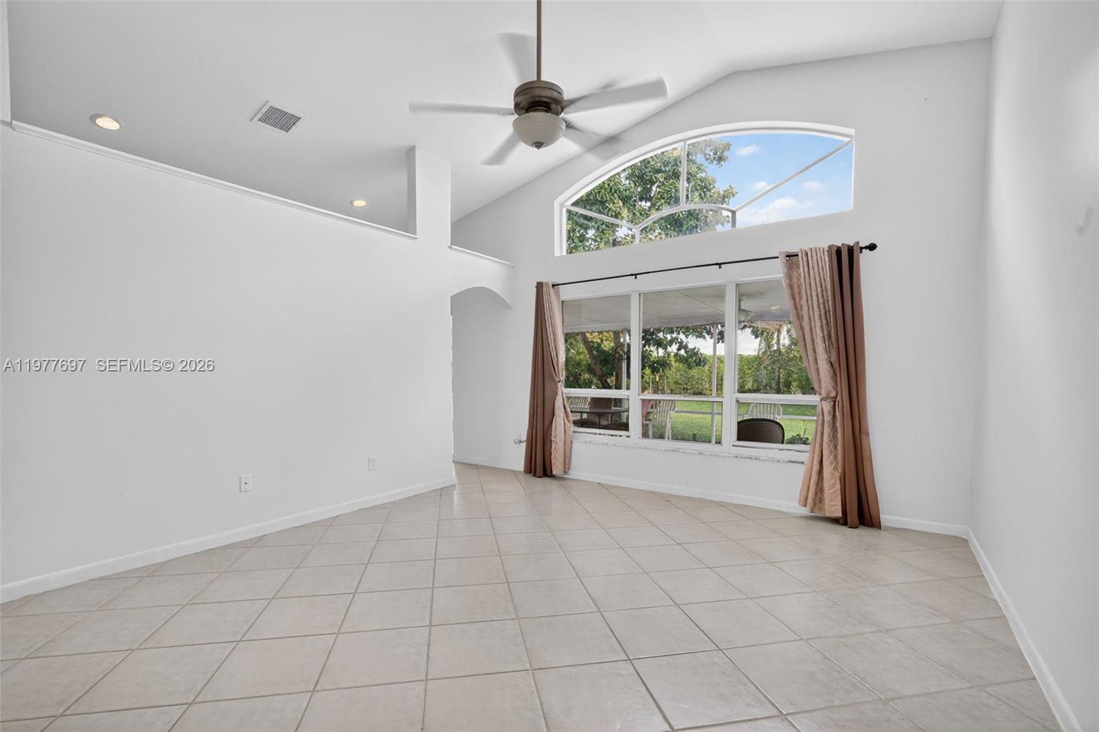 10624 Plainview Circle Boca Raton, FL 33498 - Photo 15 of 49 a view of an empty room with a window