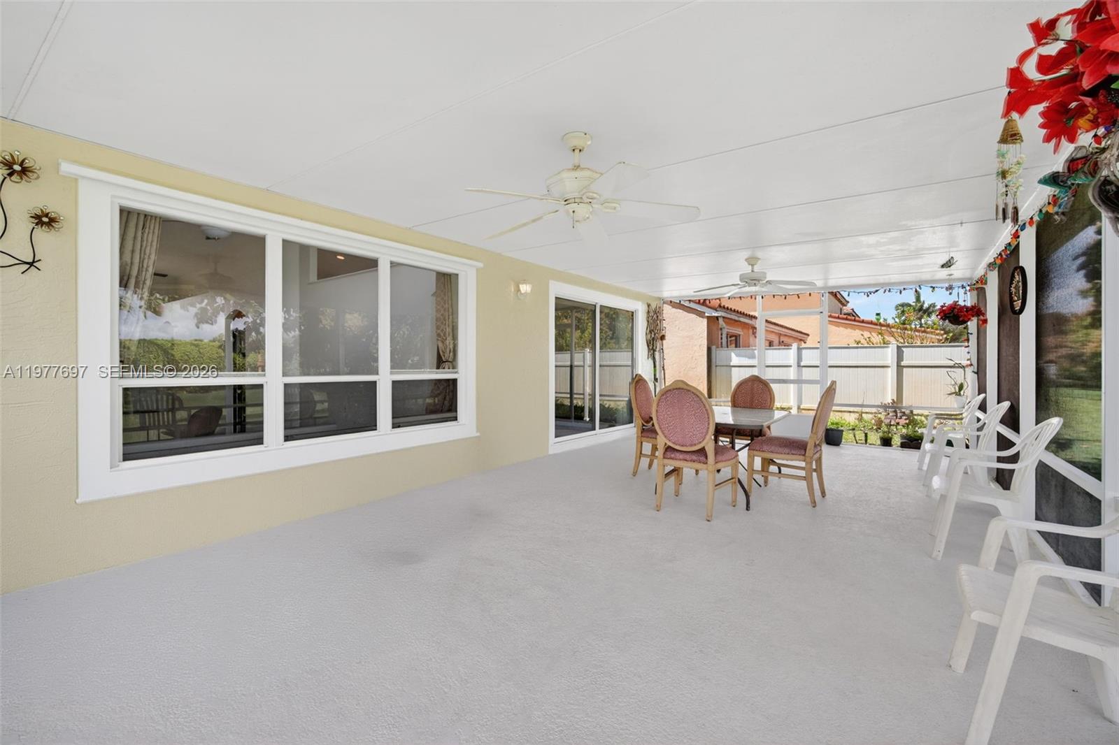 10624 Plainview Circle Boca Raton, FL 33498 - Photo 35 of 49 a view of a livingroom with furniture and a window
