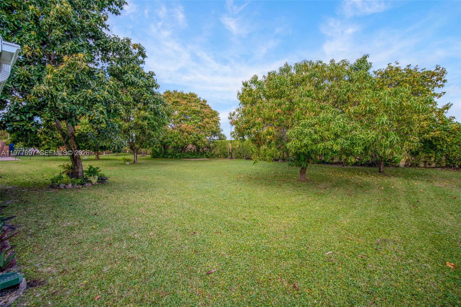 10624 Plainview Circle Boca Raton, FL 33498 - Photo 46 of 49 a view of a green yard
