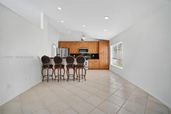 a view of a dining room with furniture