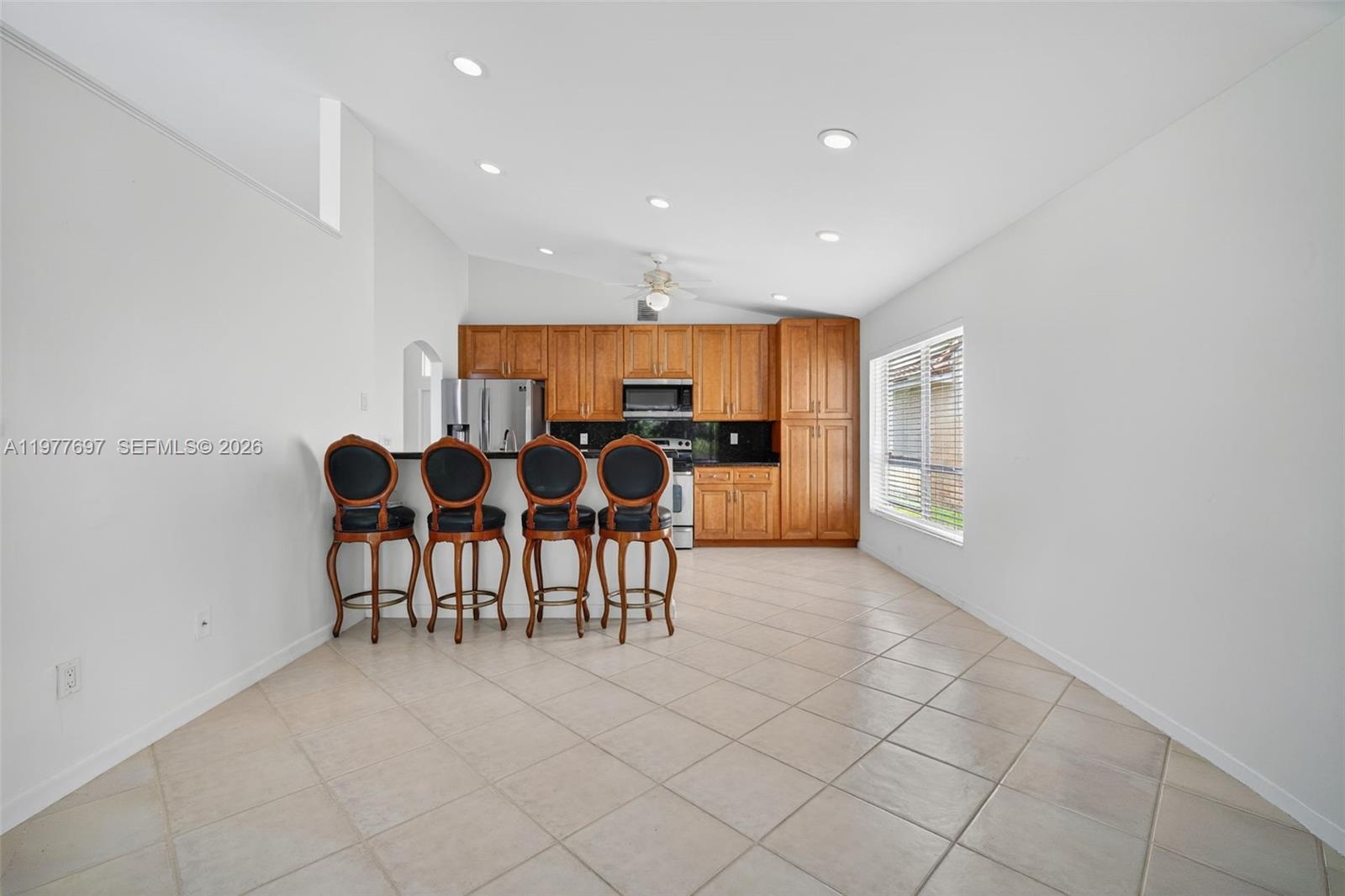 10624 Plainview Circle Boca Raton, FL 33498 - Photo 6 of 49 a view of a dining room with furniture
