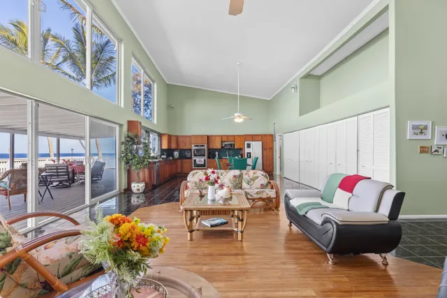 a living room with furniture and white walls