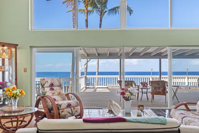 a room with lots of chairs and mirrors