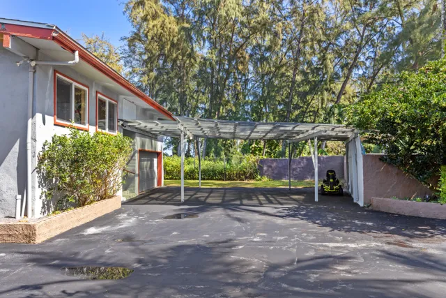a view of a house with a street
