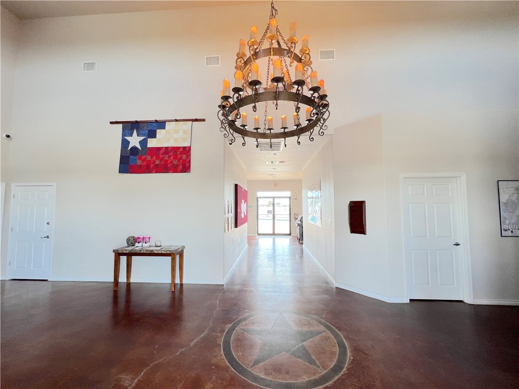 5 Augusta Circle Ingleside, TX 78362 - Photo 17 of 27 a living room with furniture and a chandelier