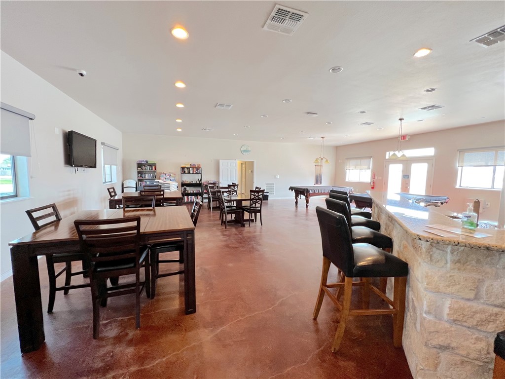 5 Augusta Circle Ingleside, TX 78362 - Photo 20 of 27 a living room with lots of furniture and a flat screen tv