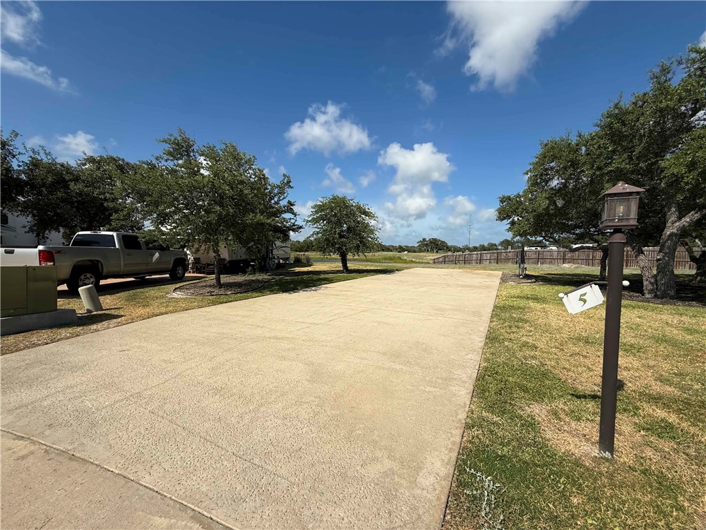 5 Augusta Circle Ingleside, TX 78362 - Photo 2 of 27 a view of swimming pool with outdoor seating and plants