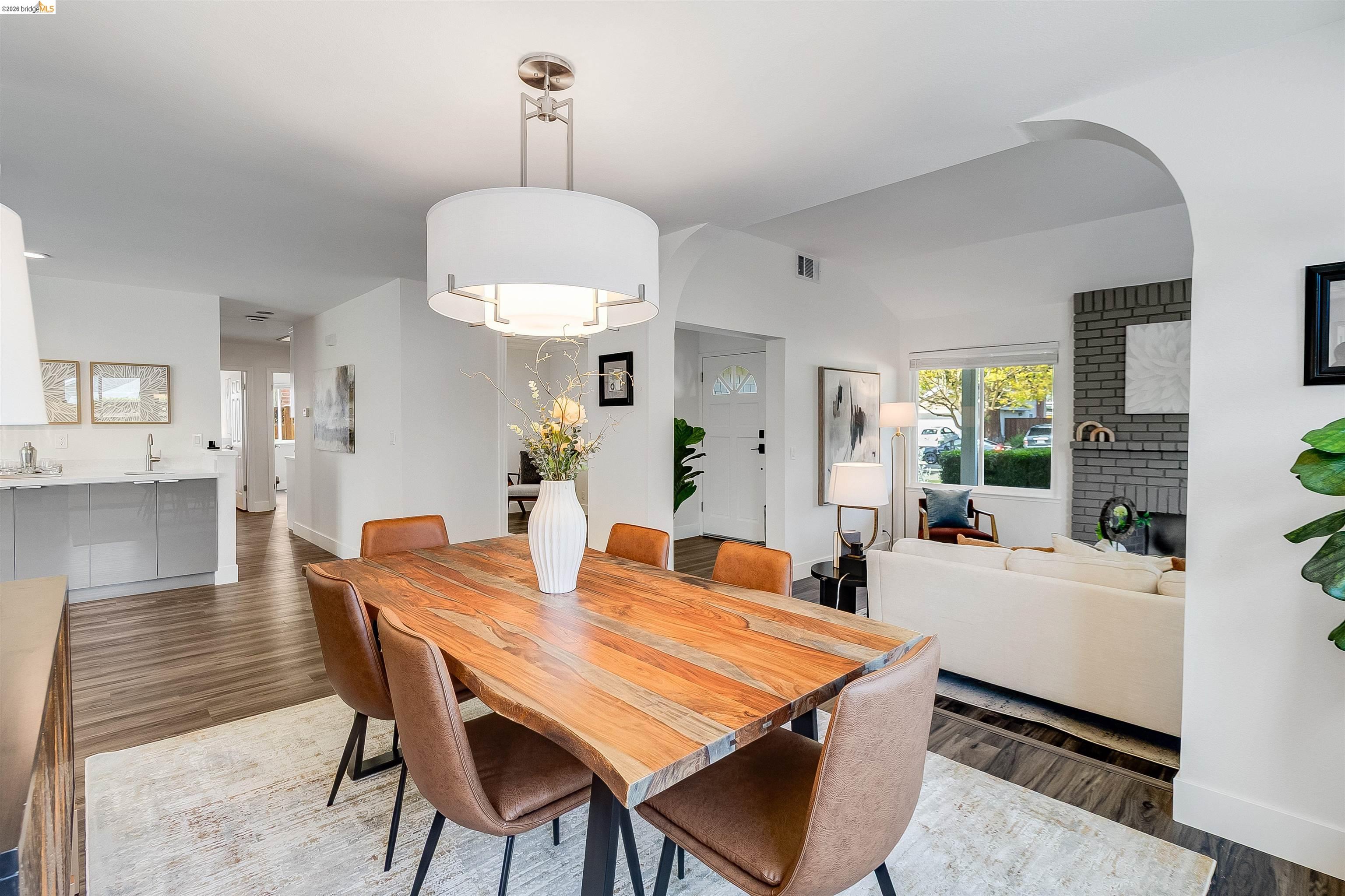 9980 Mangos Drive San Ramon, CA 94583 - Photo 11 of 41 Dining room with wood finished floors and arched walkways