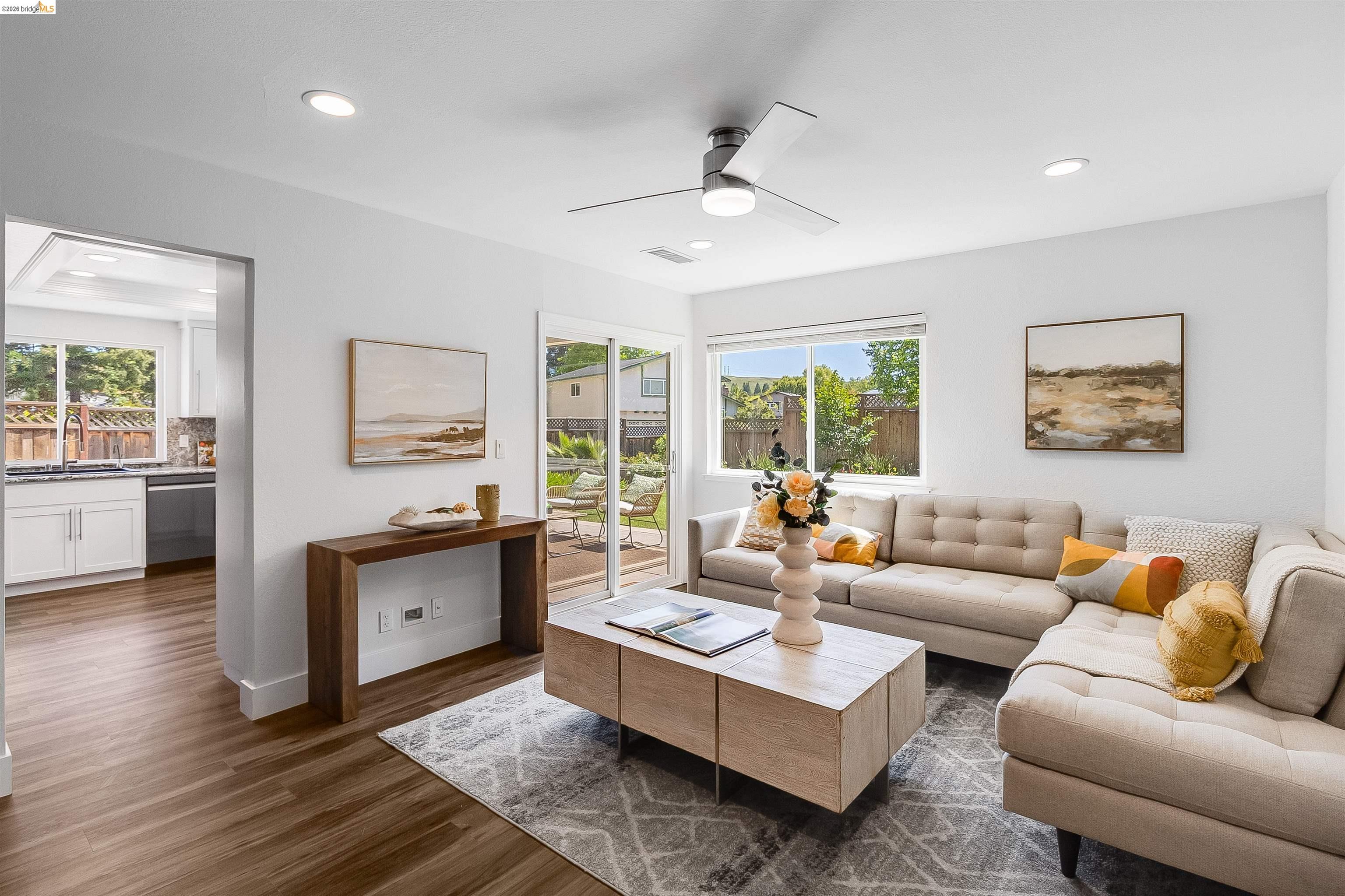 9980 Mangos Drive San Ramon, CA 94583 - Photo 16 of 41 Living room with a ceiling fan, dark wood-style flooring, and recessed lighting