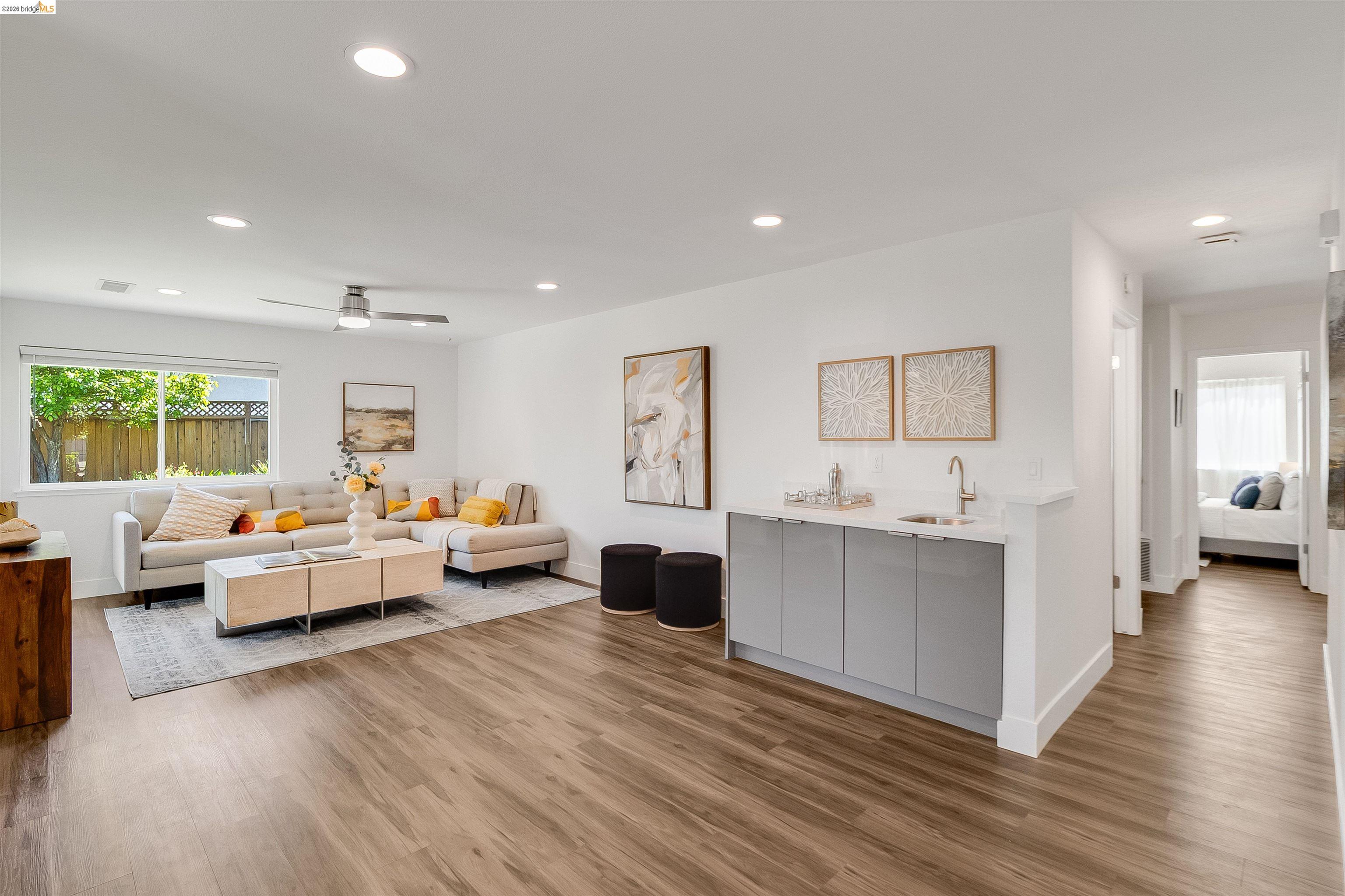 9980 Mangos Drive San Ramon, CA 94583 - Photo 17 of 41 Living area with light wood-style floors, recessed lighting, and a ceiling fan